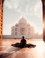 person-sitting-in-front-of-the-taj-mahal-2387871